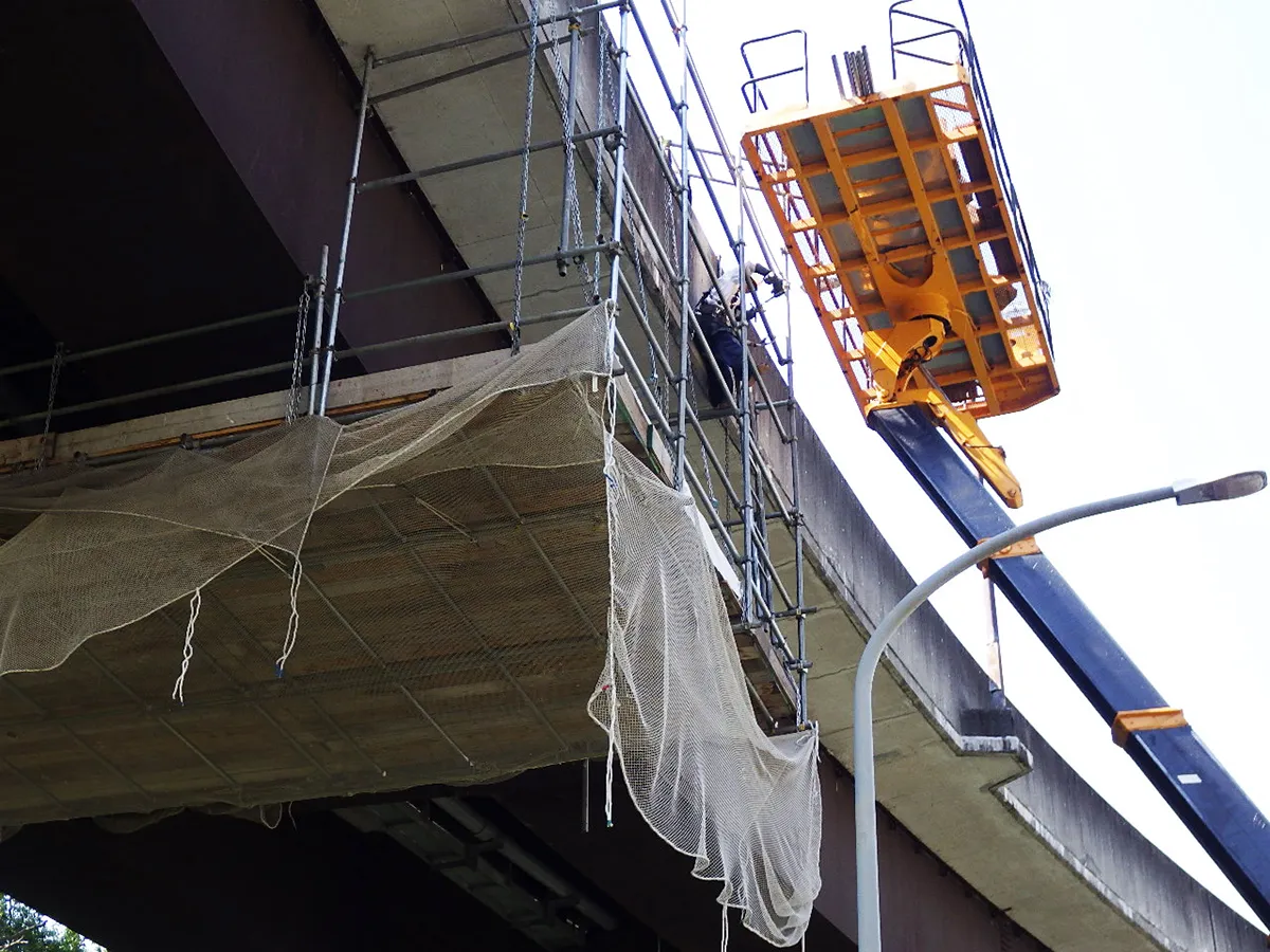 名塩新橋外添架管更生工事